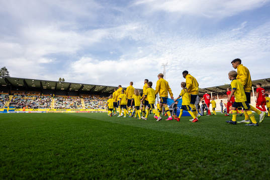 Players of Sweden enter the pitch