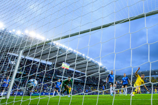 Viktor Gyökeres of Sweden scores 0-1 behind goalkeeper
