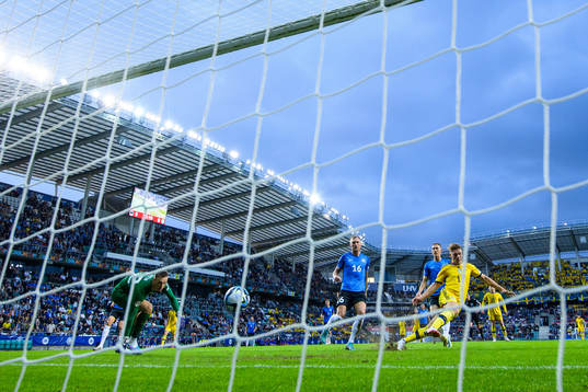Viktor Gyökeres of Sweden scores 0-1 behind goalkeeper
