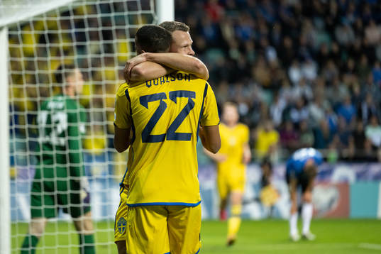 Robin Quaison and Viktor Claesson of Sweden celebrate