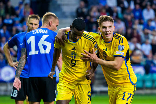 Alexander Isak and Viktor Gyökeres of Sweden celebrate the