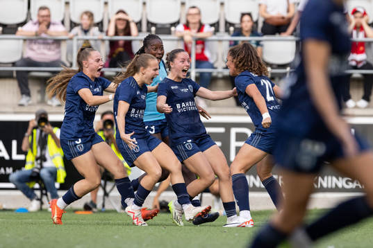 Players of Paris FC celebrate