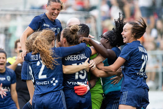 Players of Paris FC celebrate