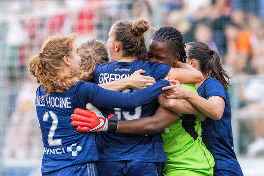 Players of Paris FC celebrate