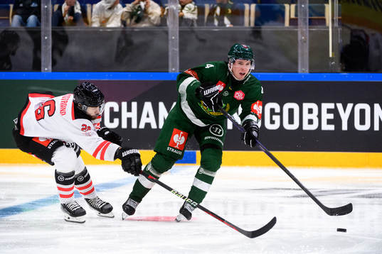 Patrick Bjorkstrand of Aalborg Pirates and Oscar Lawner of
