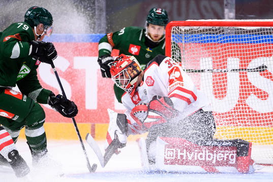 Patrik Lundh of Färjestad against goaltender Albert