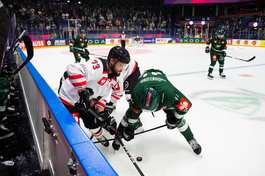Tommy Giroux of Aalborg Pirates and Henrik Björklund of