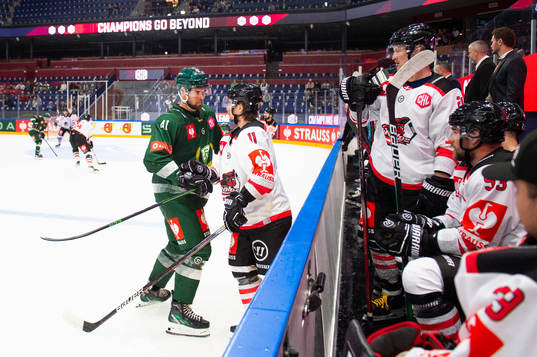 Henrik Björklund of Färjestad and Thomas Vilstrup