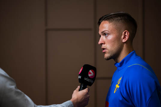 of the Swedish national football team at a Mixed Zone
