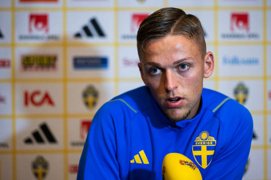 of the Swedish national football team at a Mixed Zone