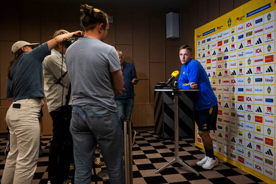 of the Swedish national football team at a Mixed Zone