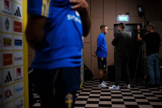 of the Swedish national football team at a Mixed Zone