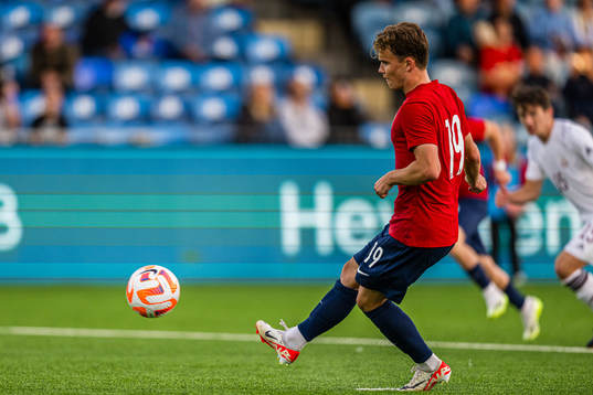 Kristian Fredrik Malt Arnstad of Norway scores the 3-0 goal