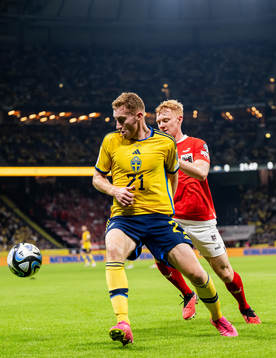 Dejan Kulusevski of Sweden and Nicolas Seiwald of Austria