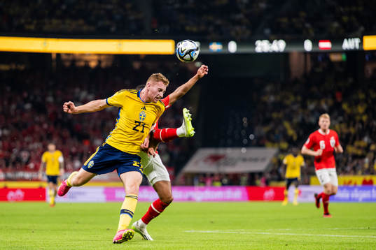 Dejan Kulusevski of Sweden and Phillipp Mwene of Austria