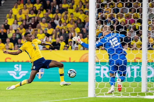 Alexander Isak of Sweden against goalkeeper Alexander
