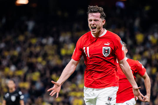 Michael Gregoritsch of Austria celebrates