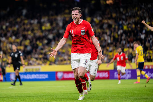 Michael Gregoritsch of Austria celebrates