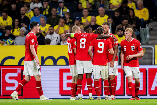 Marko Arnautovic of Austria celebrate with teammates