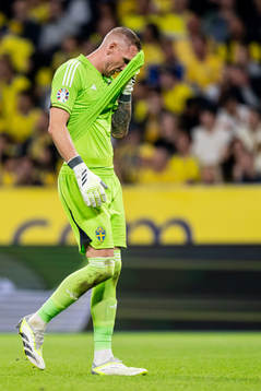 Goalkeeper Robin Olsen of Sweden looks dejected