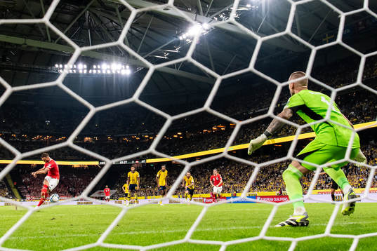 Marko Arnautovic of Austria scores the 0-3 goal against