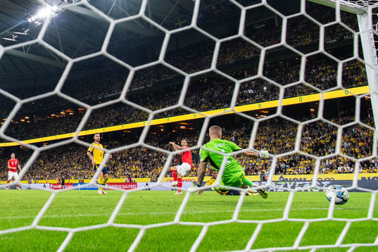Marko Arnautovic of Austria scores 0-2 behind Linus