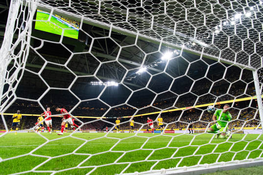 Marko Arnautovic of Austria celebrates and goalkeeper Robin