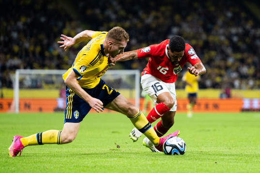 Dejan Kulusevski of Sweden and Philip Mwene of Austria