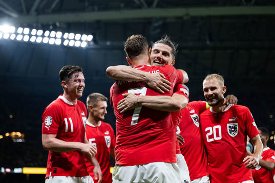 Marko Arnautovic of Austria celebrates with Marcel Sabitzer
