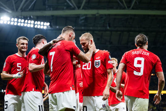 Marko Arnautovic of Austria celebrates with Konrad Laimer