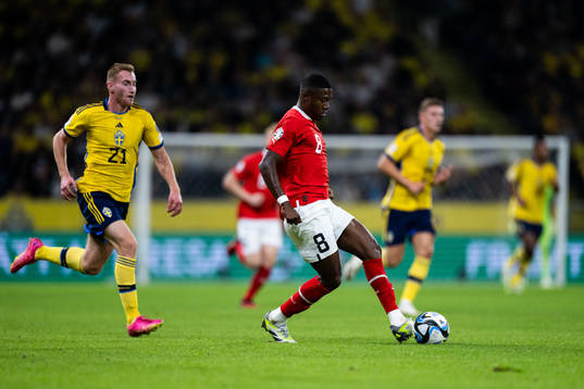 Dejan Kulusevski of Sweden and David Alaba of Austria
