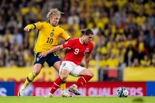 Emil Forsberg of Sweden and Marcel Sabitzer of Austria