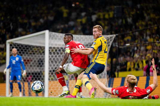 David Alaba of Austria and Dejan Kulusevski of Sweden