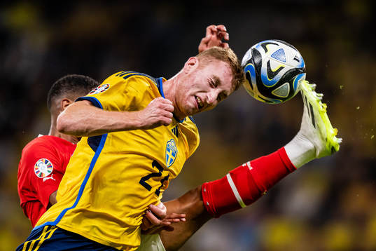 Dejan Kulusevski of Sweden and Phillipp Mwene of Austria