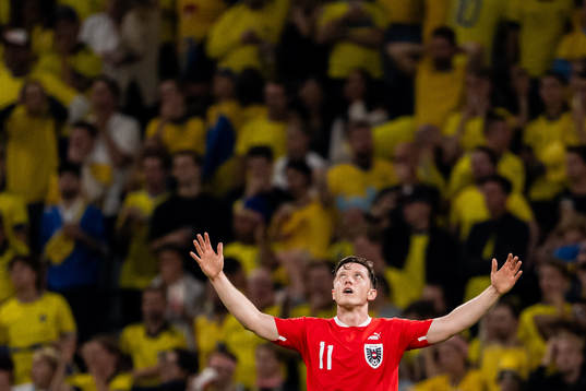 Michael Gregoritsch of Austria celebrates