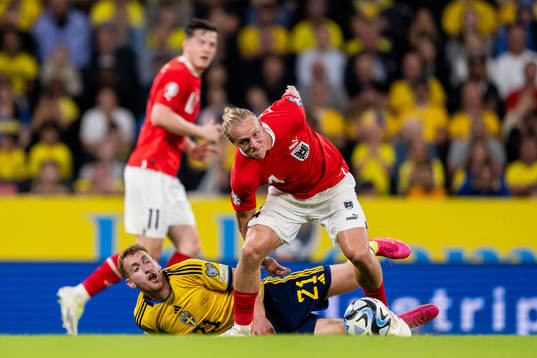 Dejan Kulusevski of Sweden and Xaver Schlager of Austria