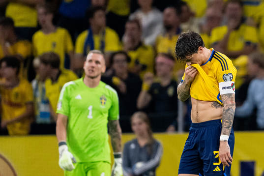 Goalkeeper Robin Olsen and Victor Nilsson Lindelöf of