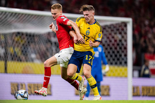 Stefan Posch of Austria and Viktor Gyökeres of Sweden