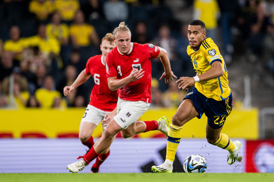 Xaver Schlager of Austria and Robin Quaison of Sweden