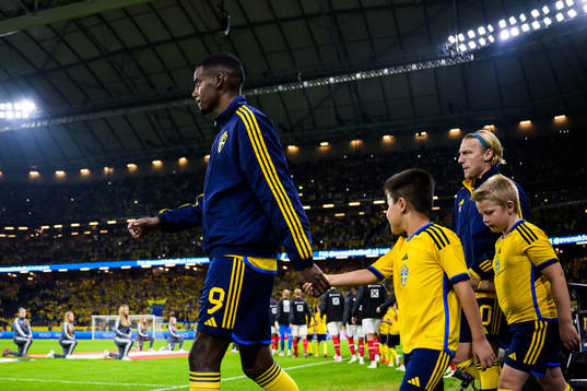 Alexander Isak and Emil Forsberg of Sweden enter the pitch