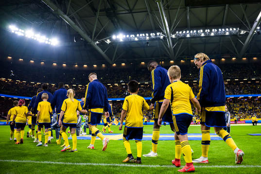 Alexander Isak and Emil Forsberg of Sweden enter the pitch