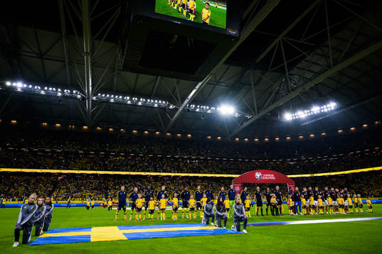 Players of Sweden and of Austria lined up