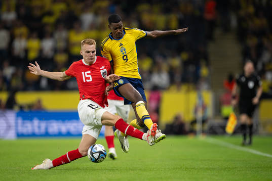 Philipp Lienhart of Austria and Alexander Isak of Sweden
