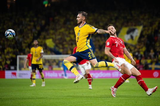 Linus Wahlqvist Egnell of Sweden and Marko Arnautovic of