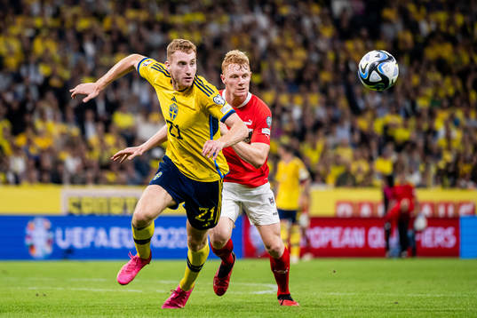 Dejan Kulusevski of Sweden and Nicolas Seiwald of Austria