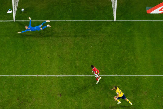 goalkeeper Alexander Schlager of Austria lets in 1-3 by