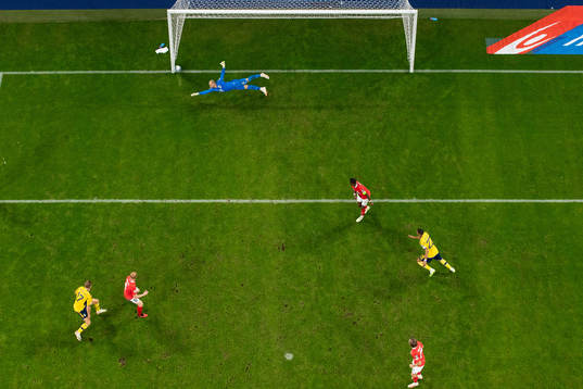 goalkeeper Alexander Schlager of Austria lets in 1-3 by