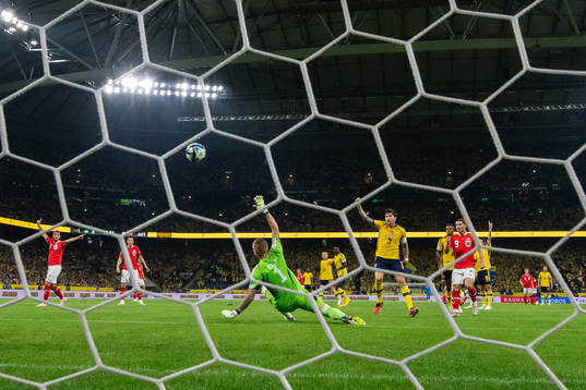 goalkeeper Robin Olsen and Victor Nilsson Lindelöf of