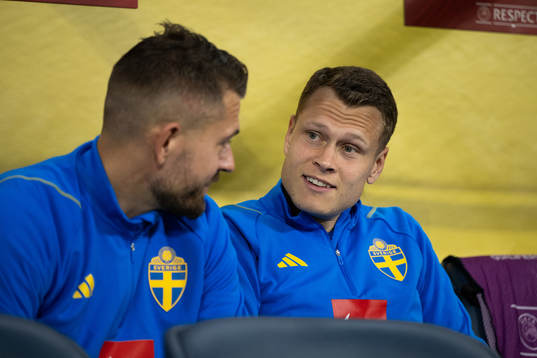 Goalkeeper Kristoffer Nordfeldt and Viktor Claesson of