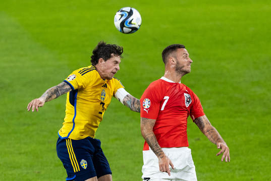Victor Nilsson Lindelöf of Sweden and Marko Arnautovic of